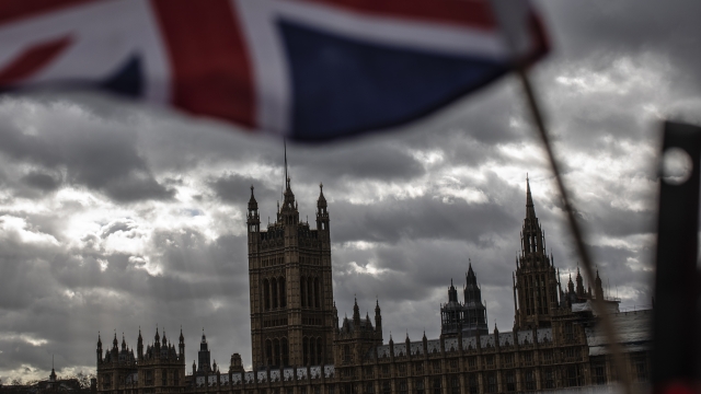 A Union flag flies outside the Houses of Parliament on March 13, 2019 in London, England.