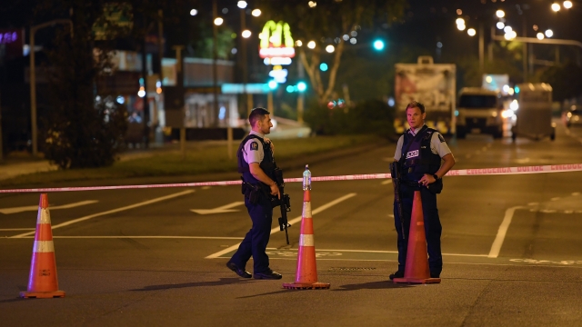 Two police officers keep watch following New Zealand mosque attacks