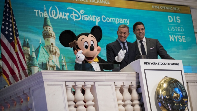 Disney CEO Bob Iger and Mickey Mouse