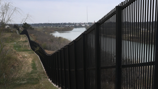 A border fence is seen along the U.S.-Mexico border