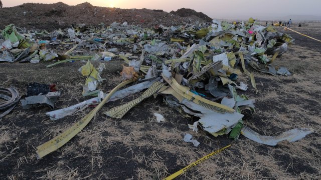 A debris pile sits just outside the impact crater where Ethiopian Airlines Flight ET302 crashed.