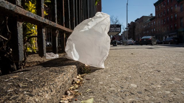 A plastic bag blows down the street in New York.
