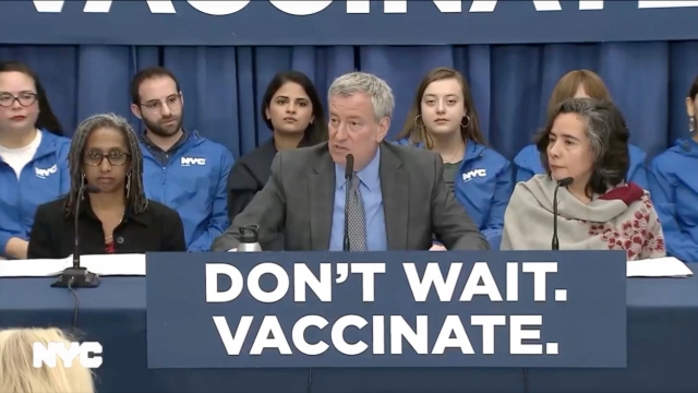 New York City mayor and public officials hold a press conference on vaccinating against measles.