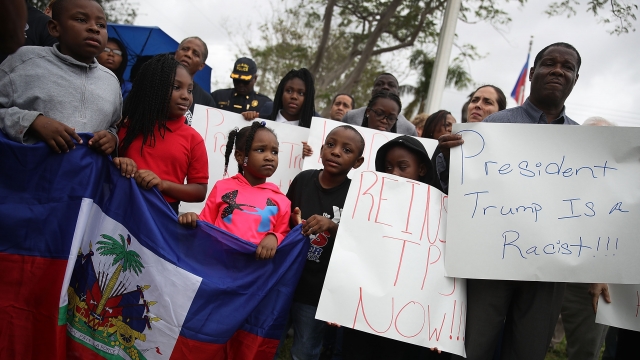 People together for a rally commemorating the 2010 earthquake in Haiti.