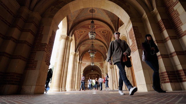 Students walk on UCLA's campus