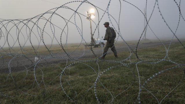 A U.S. Army soldier stands on guard duty near the U.S.-Mexico border.