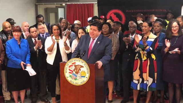 Illinois Governor JB Pritzker holds a press conference to announce a bill to legalize marijuana on May 4, 2019.