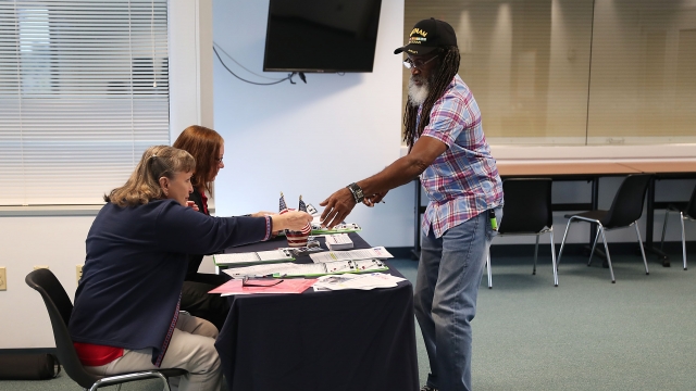 An former convict registers to vote in Florida