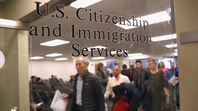Immigrants prepare to become American citizens at a naturalization service