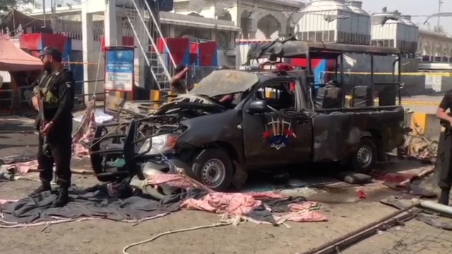 The remains of a police van after a suicide bombing