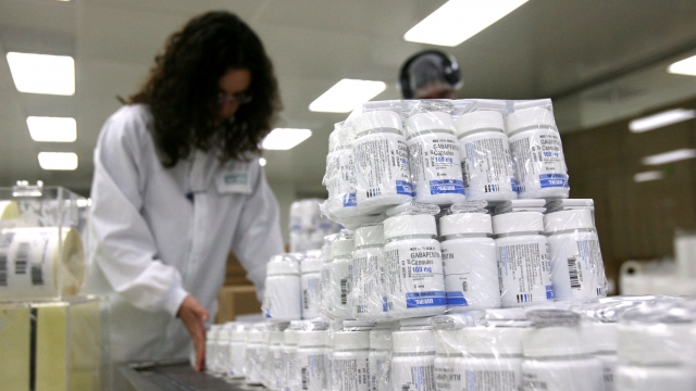 Teva Pharmaceuticals workers pack drugs at the company's manufacturing plant in Jerusalem