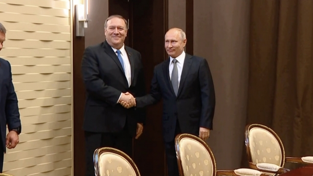 Mike Pompeo and Russian President Vladimir Putin