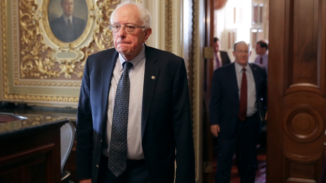 Democratic presidential candidate Sen. Bernie Sanders walks through the Senate Reception Room at the U.S. Capitol