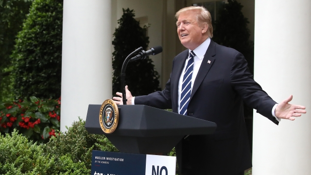 President Donald Trump speaks at a podium
