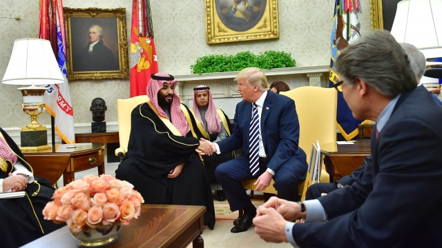 President Donald Trump shaking hands with Crown Prince Mohammed bin Salman