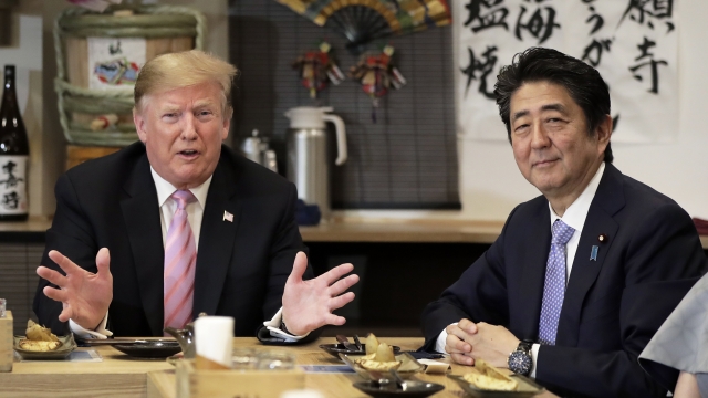 U.S. President Donald Trump speaks as Japanese Prime Minister Abe Shinzō looks on