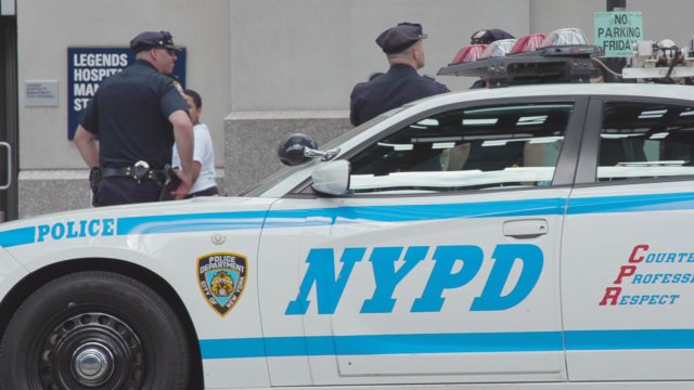 NYPD car and officers
