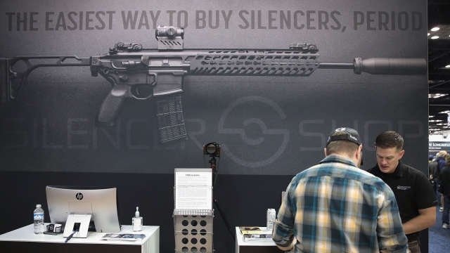Gun show display for silencers.