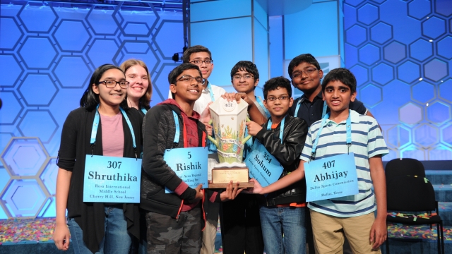 The eight 2019 Scripps National Spelling Bee champions on stage