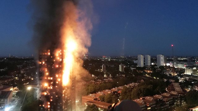A huge fire engulfs the 24-story Grenfell Tower in West London.