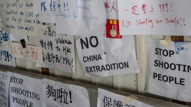 Protest posters on the wall of a walkway near the Legislative Council