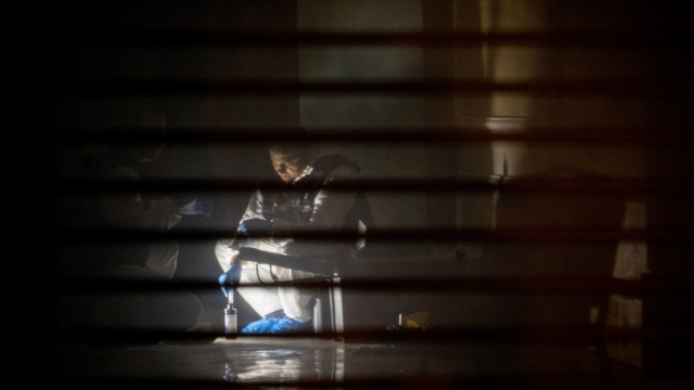 Turkish forensic police work in a room inside the Saudi Arabian consulate general residence