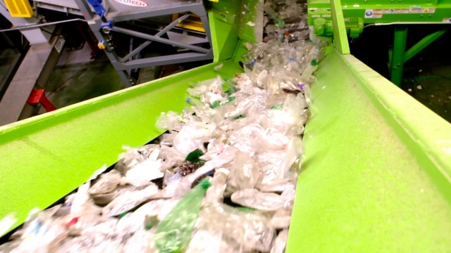 Inside a recycling plant that makes fiber from single use plastic bottles.