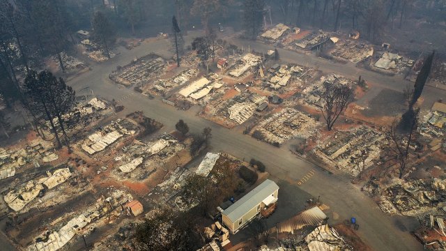 A neighborhood lays in ruins after the Camp Fire burned through Paradise, California in November 2018.