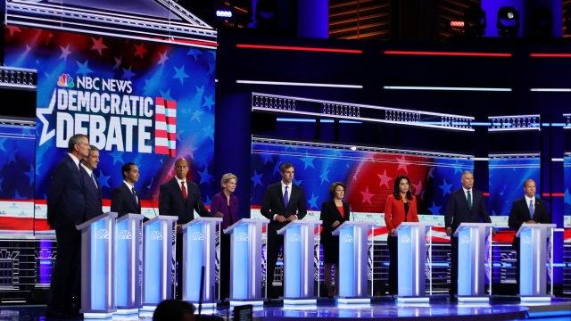 10 Democratic presidential candidates on stage for a debate.