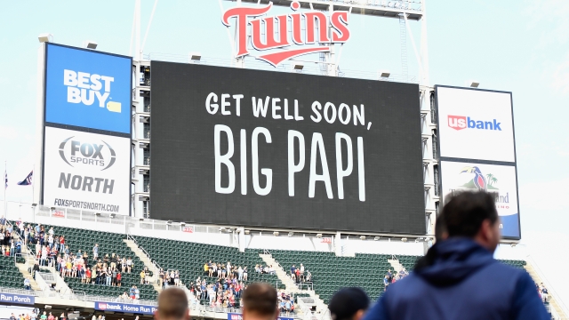 The Minnesota Twins and Boston Red Sox observe a moment of silence before the game for former player David Ortiz on June 17