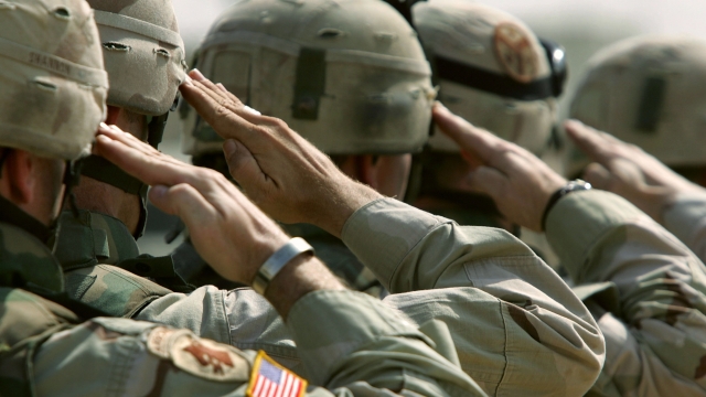 U.S. soldiers saluting