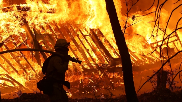 A California firefighter battles the 2018 Camp Fire