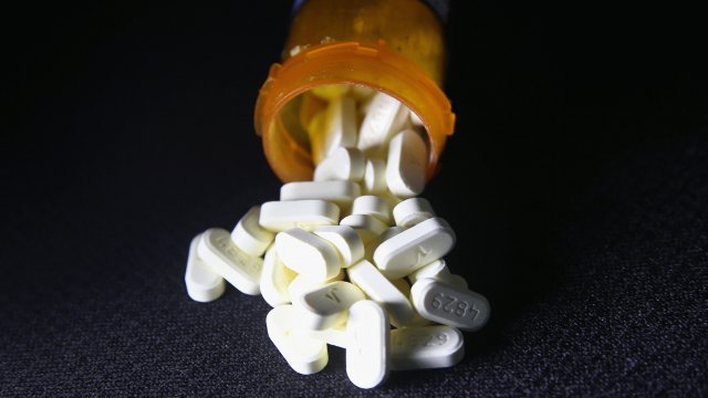 Pills spilling from a prescription bottle