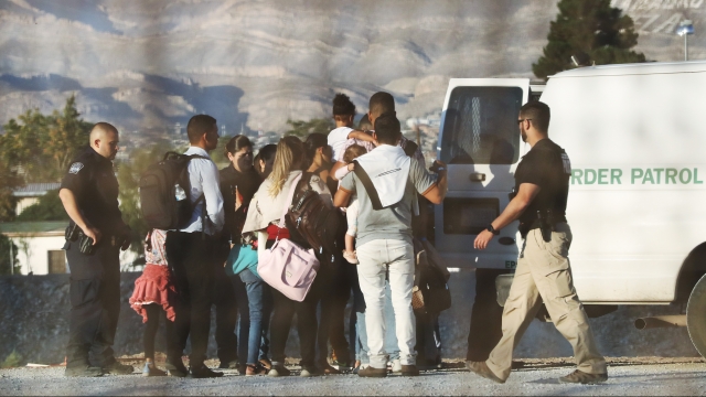 Border patrol with group of migrants