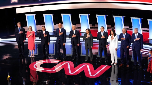 Democratic presidential candidates on stage before CNN debate.