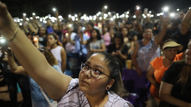 People at a vigil after the El Paso shooting