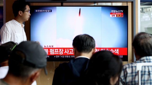 South Koreans watch news coverage of North Korea's latest missile launch