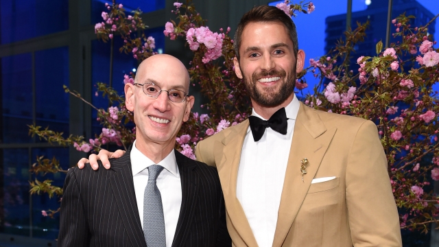 NBA Commissioner Adam Silver and Cavaliers forward Kevin Love