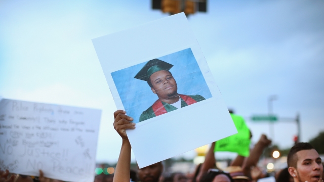 Sign of Michael Brown's picture during a protest