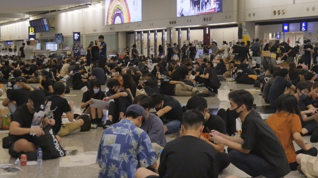 Protesters sit in at Hong Kong's airport