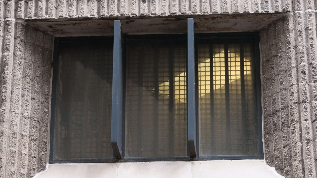 A window covered by security bars at Metropolitan Correctional Center, the federal jail where Jeffery Epstein was.