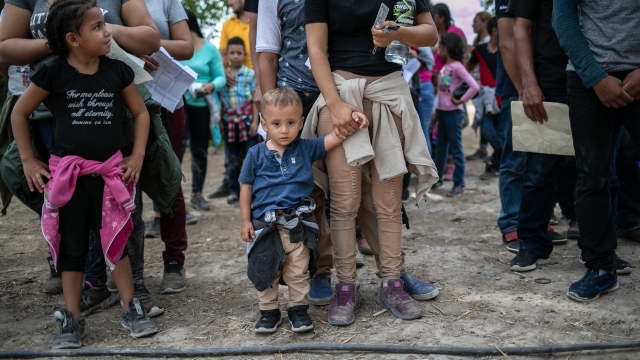 Immigrant families wait to be interviewed by U.S. Border Patrol agents on July 02, 2019  in Los Ebanos, Texas.