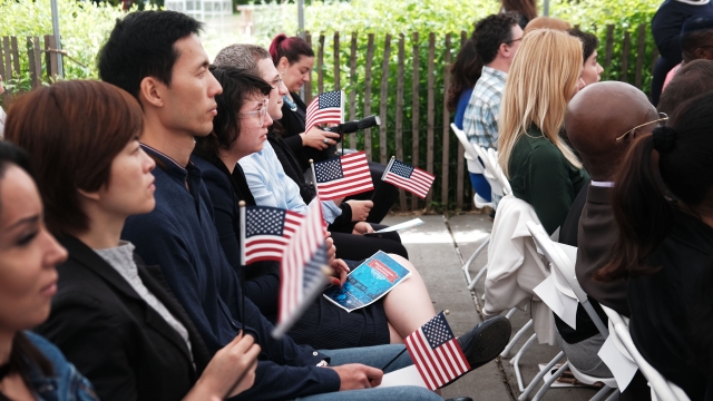 People participating in a naturalization ceremony