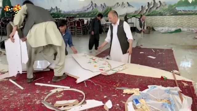 Aftermath of suicide bombing at Kabul wedding.