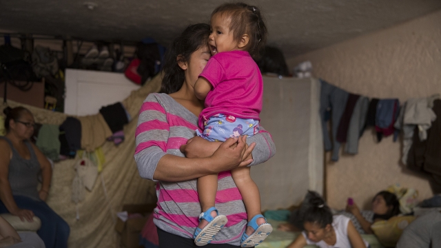 A migrant mother and her daughter from Guatemala relax at the Albergue Para Migrantes El Buen Samaritano