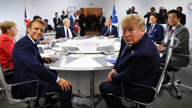 France's President Emmanuel Macron and U.S. President Donald Trump pose for the media