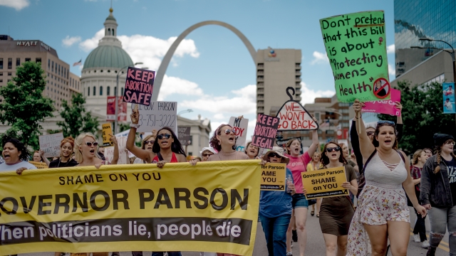 People attend a rally on abortions in downtown St. Louis, Missouri.