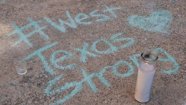 A chalk message at a memorial for victims of the mass shooting in West Texas
