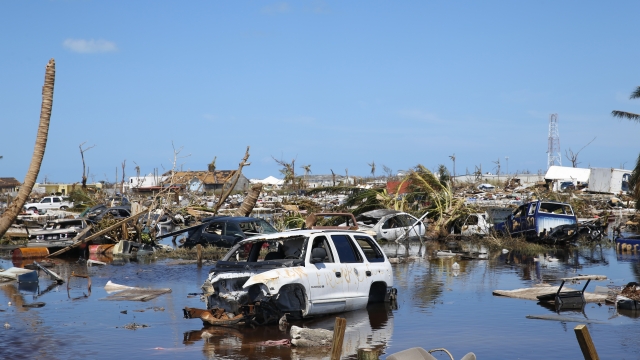 Cars and debris in water after Hurricane Dorian