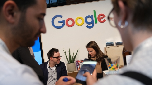 Visitors at the re:publica conferences visit the Google booth on May 06, 2019 in Berlin, Germany.